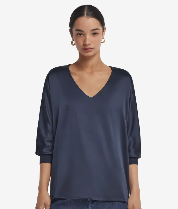 Blusa con scollo a V in seta
