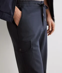 Pantalone tasconato in cotone e lino