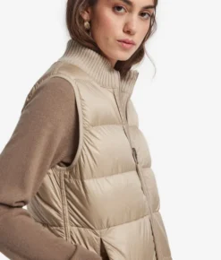 Piumino smanicato reversibile con trecce in cashmere